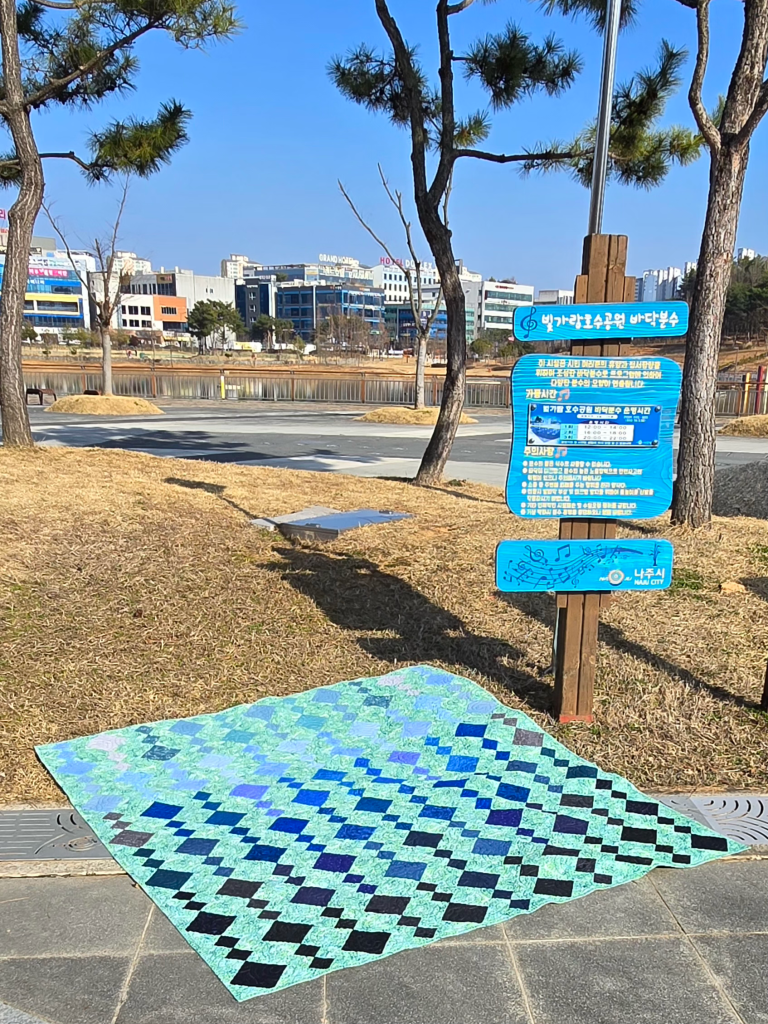 20250311_1605021.webp Finished green and blue quilt